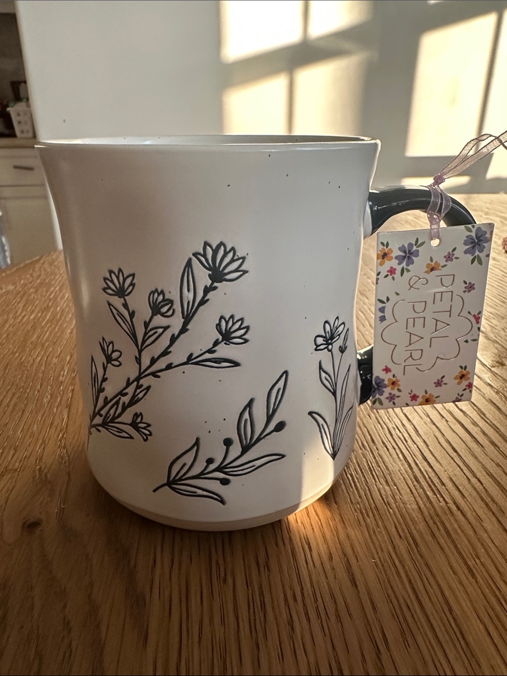 Petal & Pearl White Floral Ceramic Mug with Black Handle